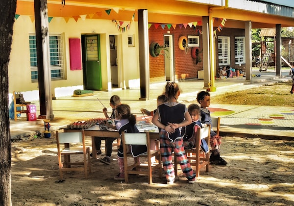 Young children studying and learning together at school